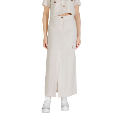 Woman wearing Jacqueline De Yong Bicolor Viscose Long Skirt with side pockets and white sneakers.