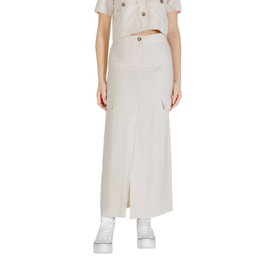 Woman wearing Jacqueline De Yong Bicolor Viscose Long Skirt with side pockets and white sneakers.