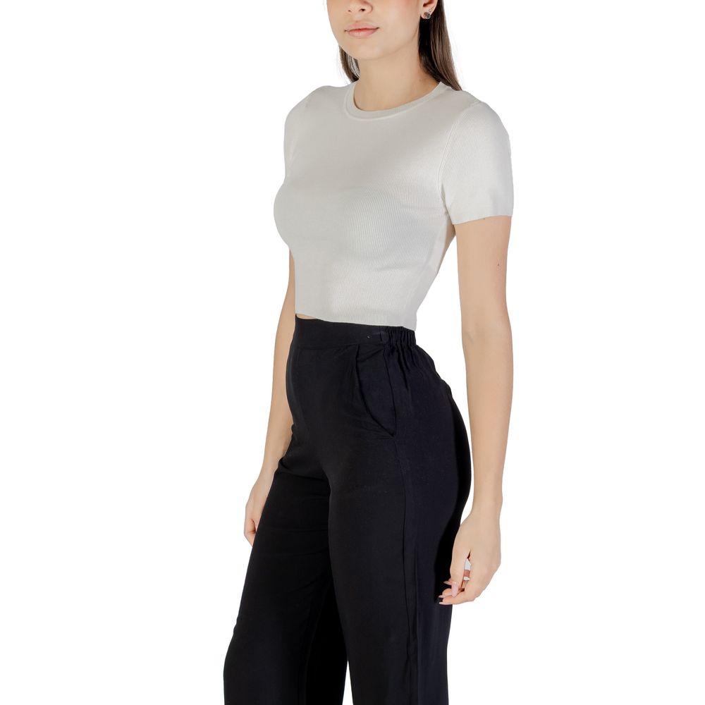 Jacqueline De Yong White Viscose Sweater on model in black trousers, ideal for summer fashion with versatile style.
