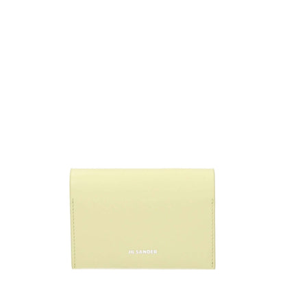 Jil Sander Yellow Leather Cardholder with button closure, 3 card slots, and front logo in lemon yellow leather.
