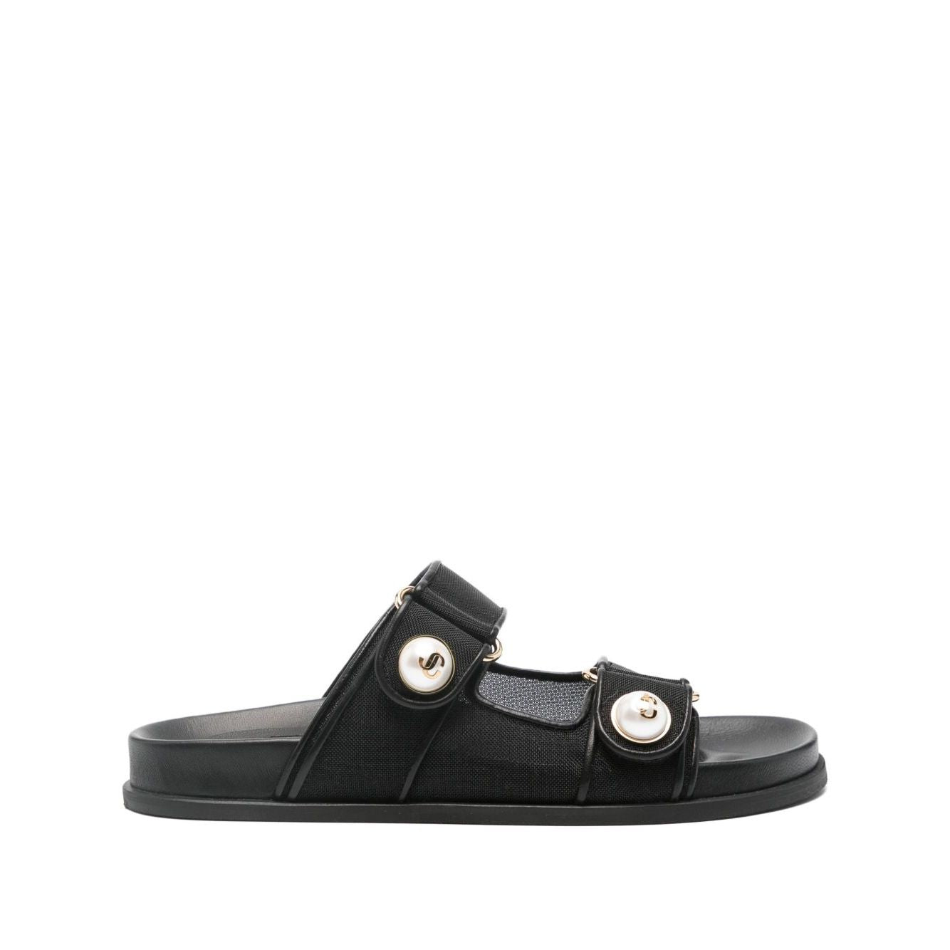 Jimmy Choo Fayence Sandal Low leather sandals with pearls, black rubber sole, double straps, faux pearl embellishments, and gold-tone hardware.