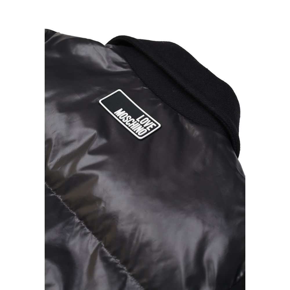 Back view of Love Moschino Black Polyester Clothing showcasing logo detail on puffer jacket.