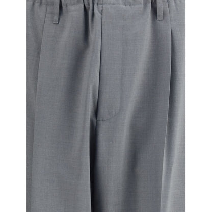 Close-up of Magliano Gray Polyester Casual Pants featuring an elasticized waistband and contemporary baggy-cut hem.