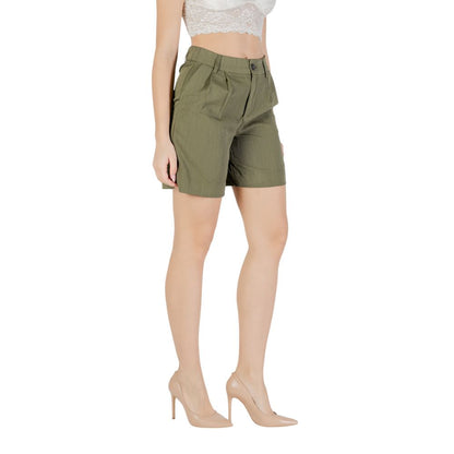 Woman wearing Only Green Viscose Bermuda Shorts with heels and lace top, featuring side pockets and button closure.