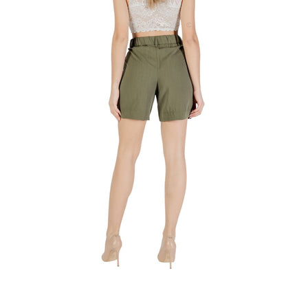 Back view of model wearing Only Green Viscose Bermuda Shorts with side pockets.