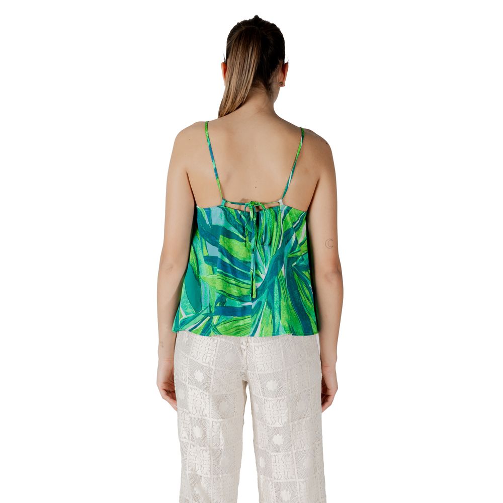 Back view of woman wearing Only Green Viscose Tank Top with floral pattern, lightweight and comfortable for summer.