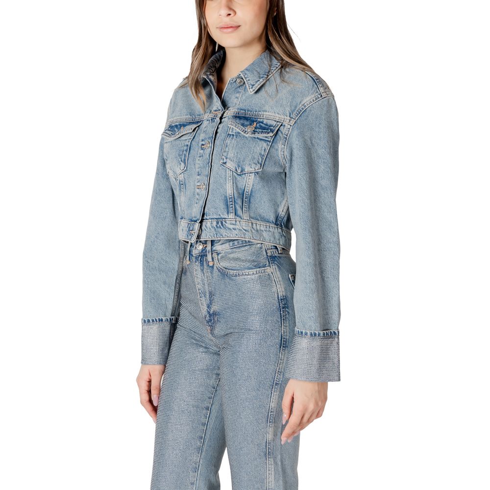 Woman wearing Only Light Blue Organic Cotton Jackets & Coat with chest pockets and highlighted buttons.