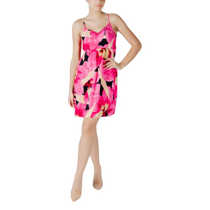 Woman wearing Only Pink Viscose Short Dress with floral design, thin straps, and V-neckline, perfect for casual summer occasions.