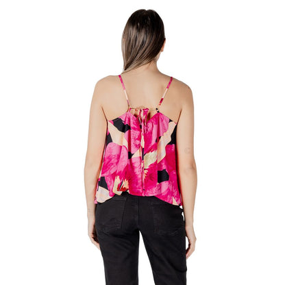 Back view of Only Pink Viscose Tank Top with floral pattern, worn by woman standing, showcasing lightweight and comfortable design.