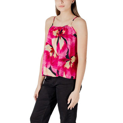 Model wearing Only Pink Viscose Tank Top with floral pattern, perfect for summer and spring, lightweight and stylish design for women.