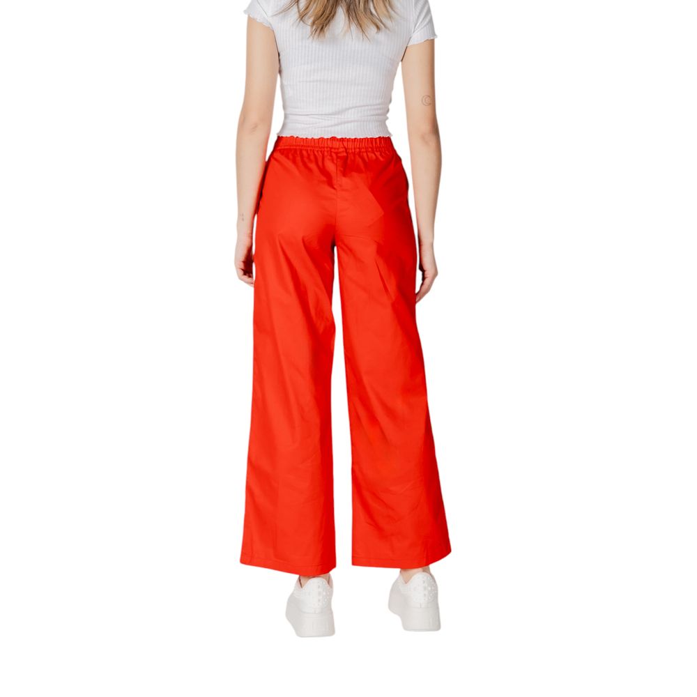 Woman wearing Only Red Cotton Casual Pants with elastic waistband and wide-leg design, perfect for a stylish summer look.