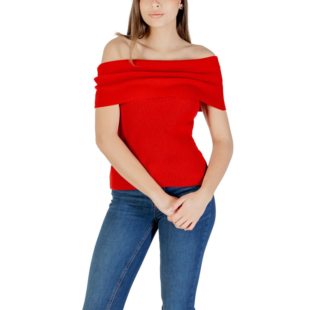 Model wearing Only Red Polyester T-Shirt with off-shoulder design and blue jeans