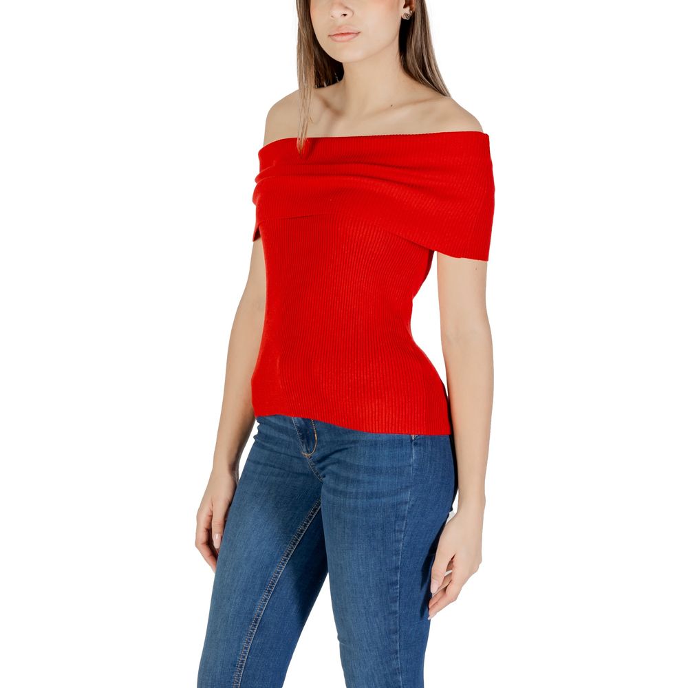Woman wearing Only Red Polyester T-Shirt, off-shoulder style with jeans, demonstrating elegant and sustainable fashion.