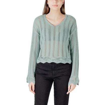 Woman wearing Only Turquoise Recycled Cotton Sweatshirt with V-neck and open-knit design.