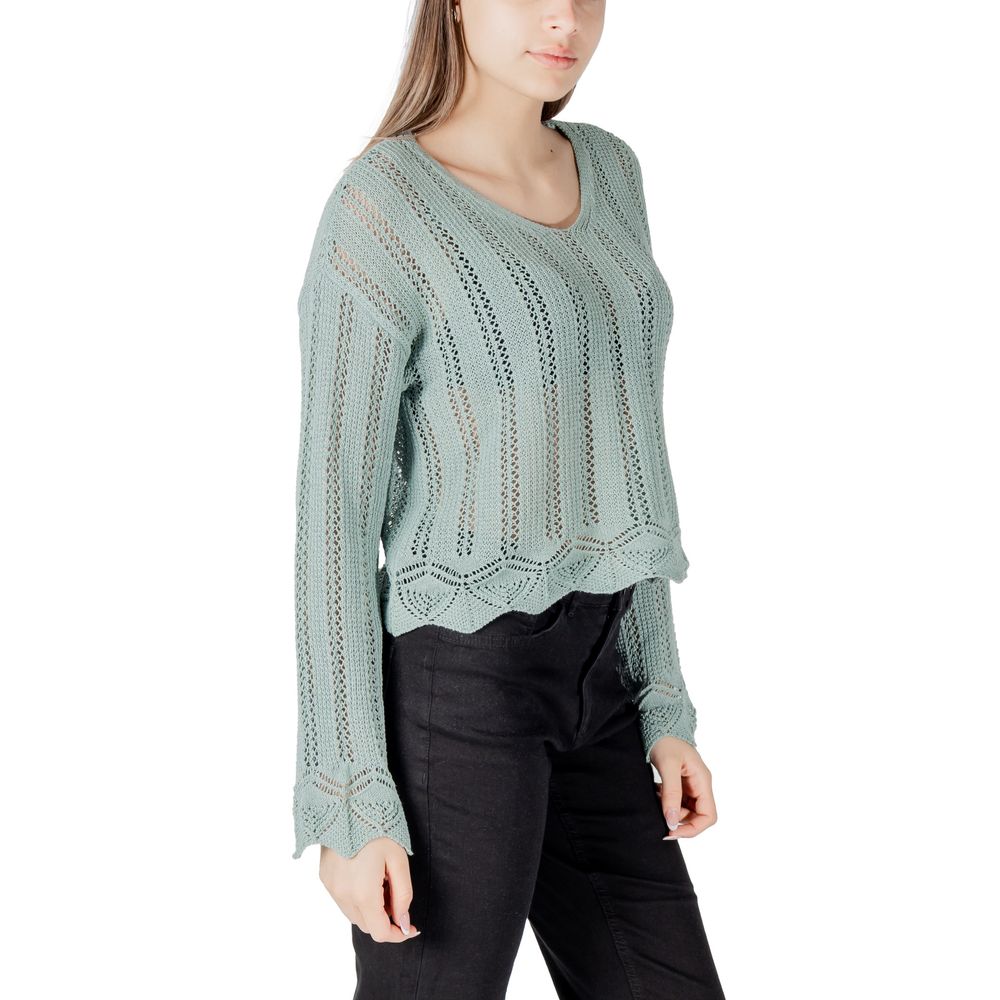 Woman wearing Only Turquoise Recycled Cotton Sweatshirt with V-neck and long sleeves, showcasing open-knit design for breathable comfort.