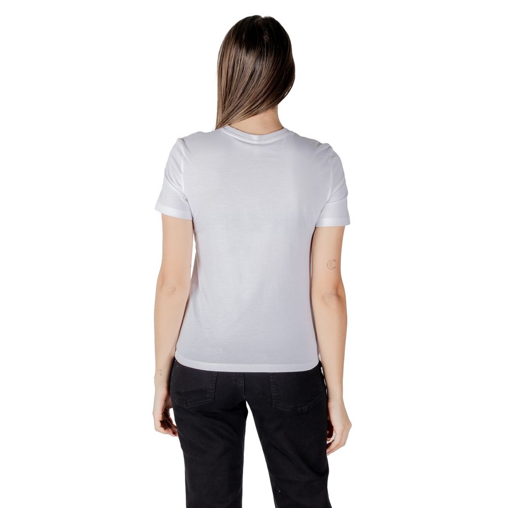 Back view of model wearing Only White Organic Cotton Long Sleeve T-Shirt