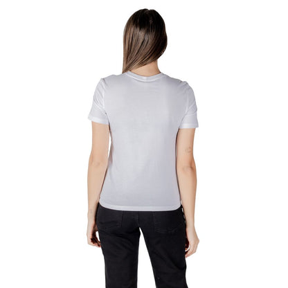 Back view of model wearing Only White Organic Cotton Long Sleeve T-Shirt