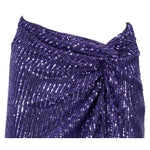 Close-up of PINKO Purple Polyester Skirt with sequin appliqué and bow, featuring a side zip closure for elegant styling.