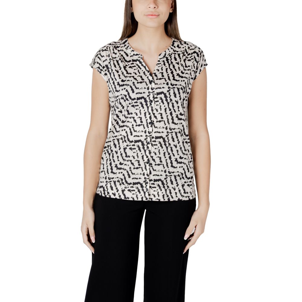 Street One Cream Cotton T-Shirt with unique print and button panel, short-sleeved, worn with black trousers for a casual-chic look.