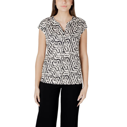 Street One Cream Cotton T-Shirt with unique print and button panel, short-sleeved, worn with black trousers for a casual-chic look.