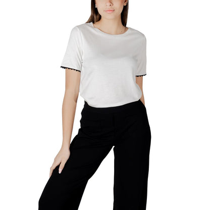Model wearing Street One White Cotton T-Shirt with decorative sleeve tape, paired with black trousers, showcasing its stylish design.