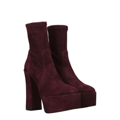 Stuart Weitzman Purple Leather Ankle Boots with high heel, suede material, and round toe design, perfect for casual wear.