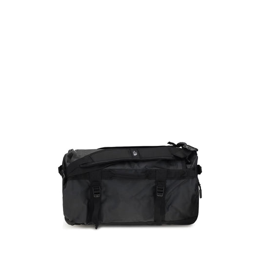 The North Face Black Nylon Luggage And Travel Base Camp Duffel S waterproof travel bag with padded handles for versatile carrying.