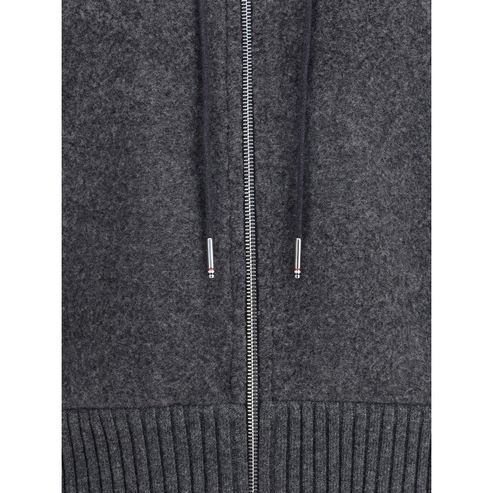 Thom Browne Gray Wool Sweatshirt with drawstring hood, dual-zipper, ribbed cuffs and hem for comfort and style.