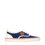 Valentino Garavani Blue Fabric Low Tops sneakers with side and back logo on white background.