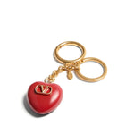 Valentino Garavani Coeur Royal key ring with red charm and polished finish, featuring logo design, 13 cm length, 3.5 cm width.