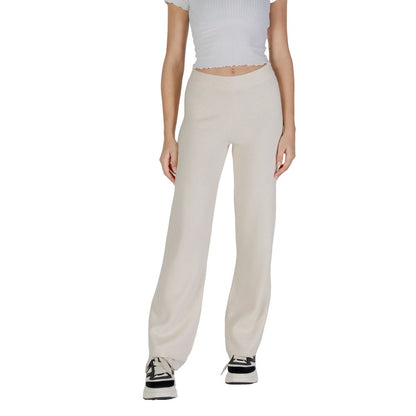 Model wearing Vero Moda Cream Viscose Casual Pants, showcasing high-quality palazzo design with a wide-leg cut and comfortable fit.