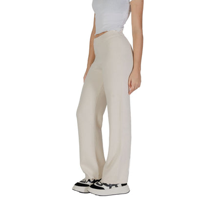 Vero Moda Cream Viscose Casual Pants worn by woman, showcasing palazzo cut and elegant style