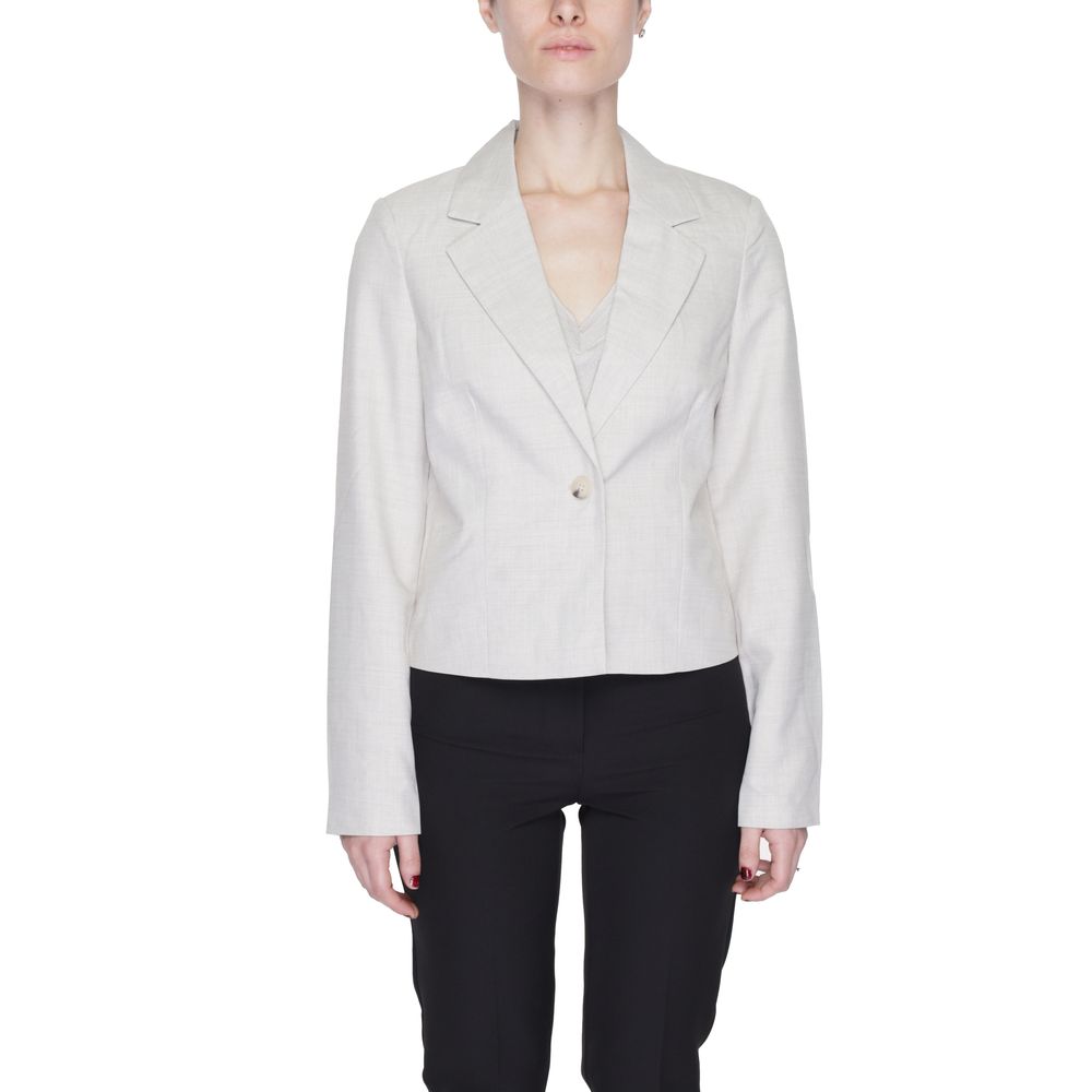 Woman wearing Vero Moda Gray Polyester Blazer with classic lapel collar and single button closure, ideal for casual and formal outfits.