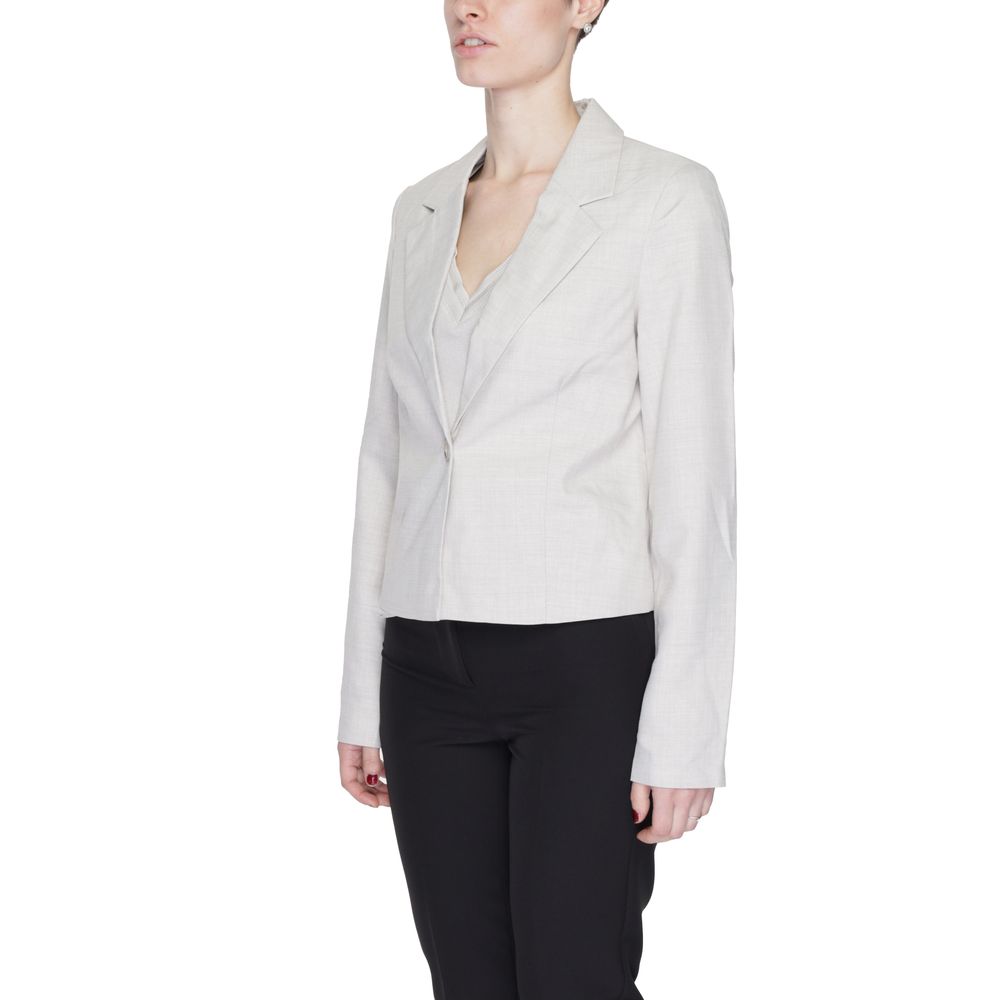 Woman wearing Vero Moda Gray Polyester Blazer with lapel collar and single button closure, side view against white background.