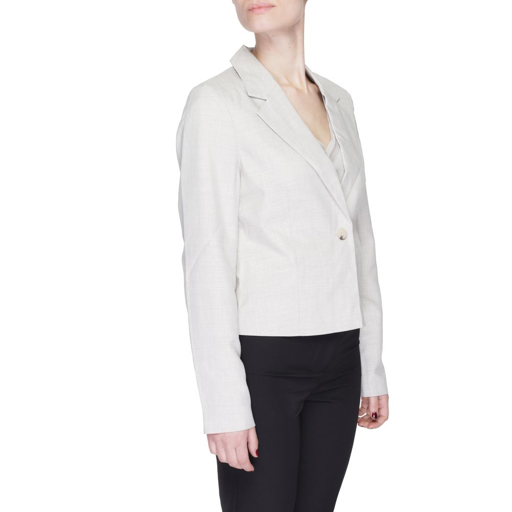 Woman wearing Vero Moda Gray Polyester Blazer with classic lapel collar and single button closure.