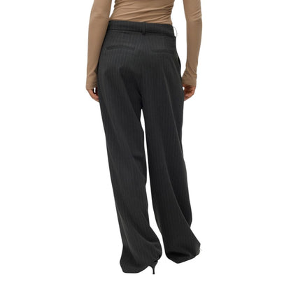 Back view of Vero Moda Gray Polyester Casual Pants with pinstripes, worn by a model, showcasing the wide-leg fit and mid-rise waist.