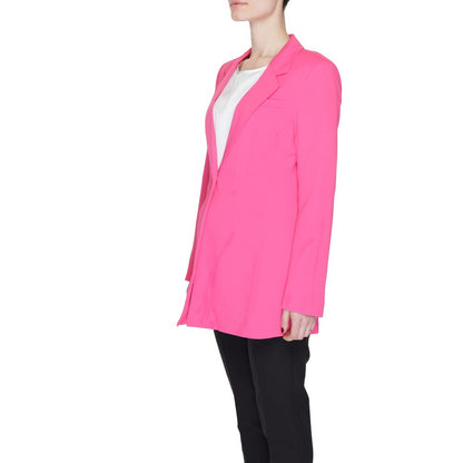 Woman wearing Vero Moda Pink Polyester Blazer showcasing long, slim fit with classic lapel and elegant style.