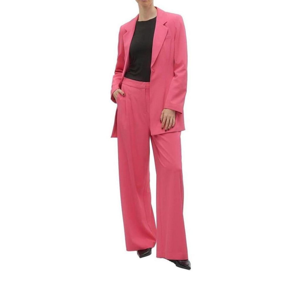 Woman wearing Vero Moda Pink Polyester Casual Pants with matching blazer, black top, and heels showcasing elegant style.