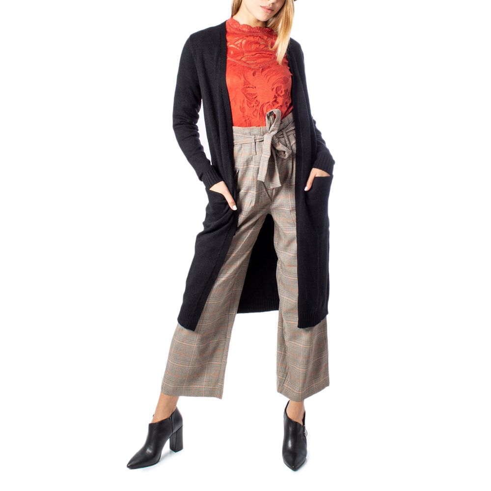 Woman wearing Vila Clothes Black Viscose Cardigan with long sleeves, styled for a casual chic look