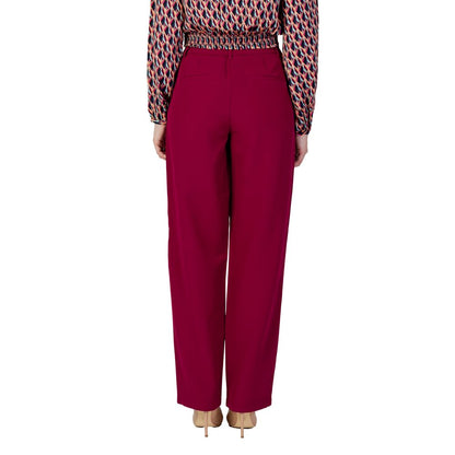 Woman wearing Vila Clothes Bordeaux Polyester Casual Pants, high-waisted wide-leg design, back view showcasing elegant fit.