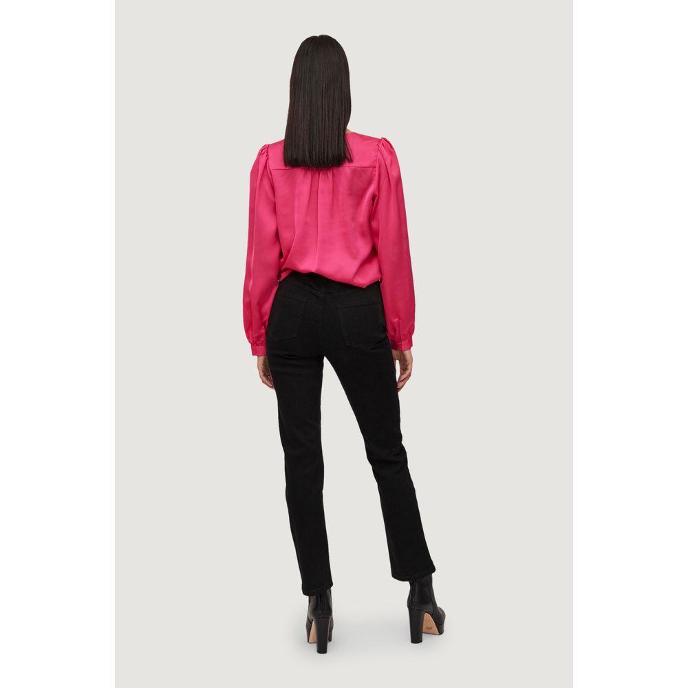 Back view of model wearing Vila Clothes Pink Polyester Blouse with long sleeves, paired with black trousers and heels.
