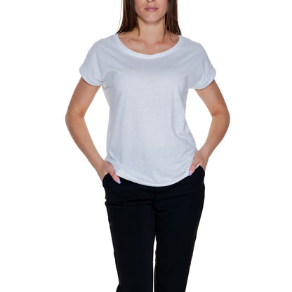 Woman wearing Vila Clothes White Cotton T-Shirt with round neckline and rolled-up sleeves for everyday style and comfort.
