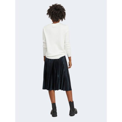 Back view of model wearing Vila Clothes White Viscose Sweatshirt with pleated skirt and boots.