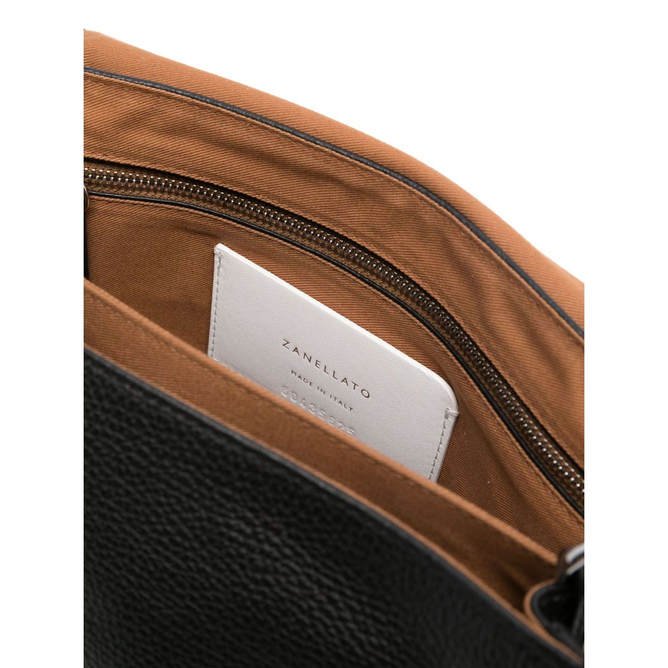 Front view with bag zipped and handles upright.